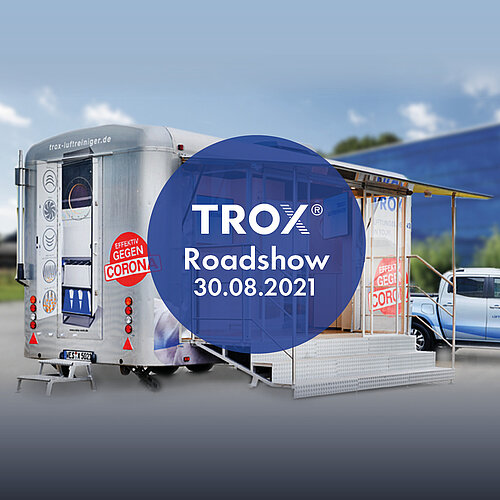 TROX-Trailer vor dem Gebäude der Firma Gebro Herwig. Text: TROX-Roadshow 30.08.2021